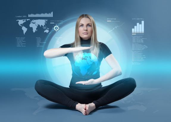 Cute blonde yoga meditation in futuristic holographic media touc
